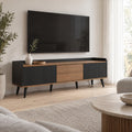 Meuble TV noir cannelé et noyer 2 tiroirs 160 cm, dans un salon