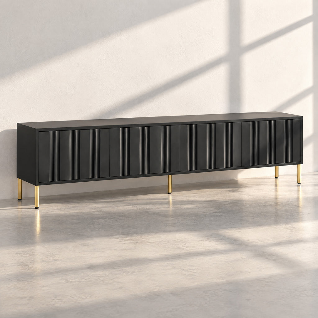 Meuble TV noir façades ondulées pieds dorés 190 cm, au soleil