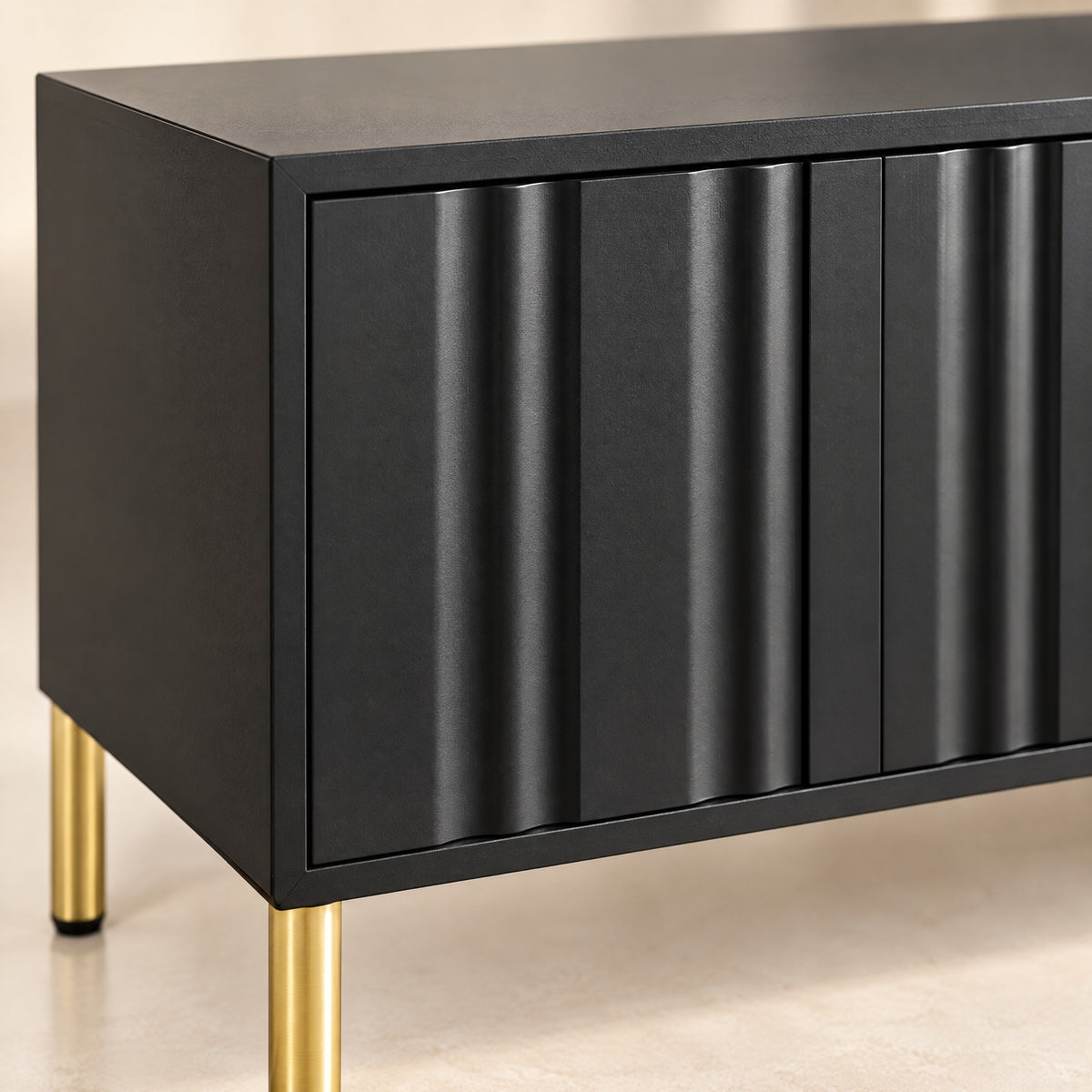Meuble TV noir façades ondulées pieds dorés 190 cm, détail de la finition