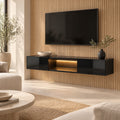 Meuble TV suspendu noir brillant avec LED 160 cm, dans un salon